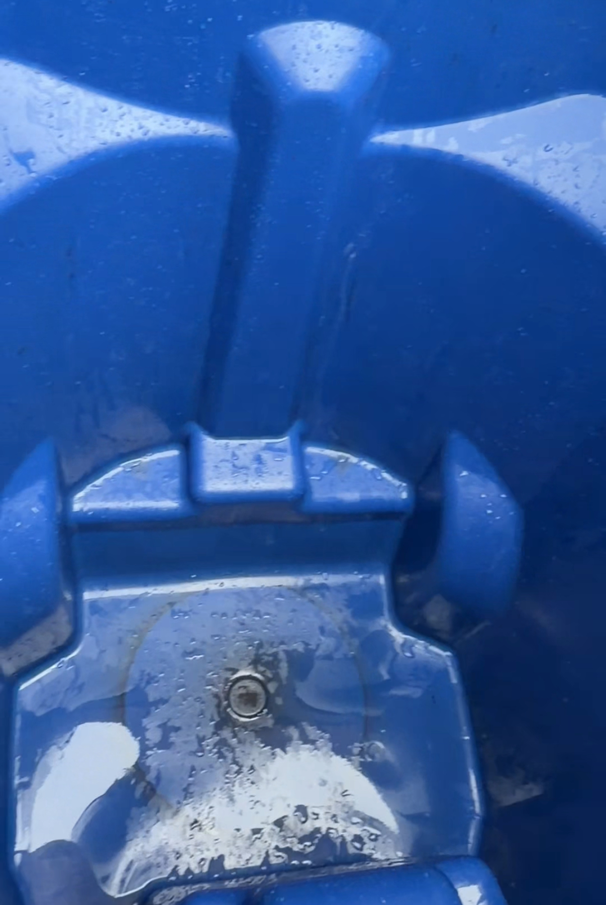 Clean trash bin after power washing